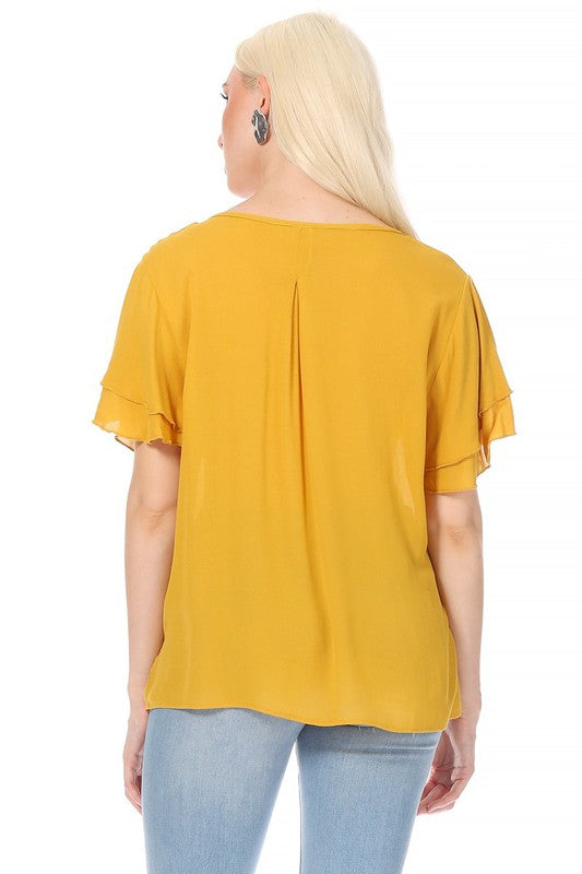 Short flutter sleeve round neck keyhole blouse.